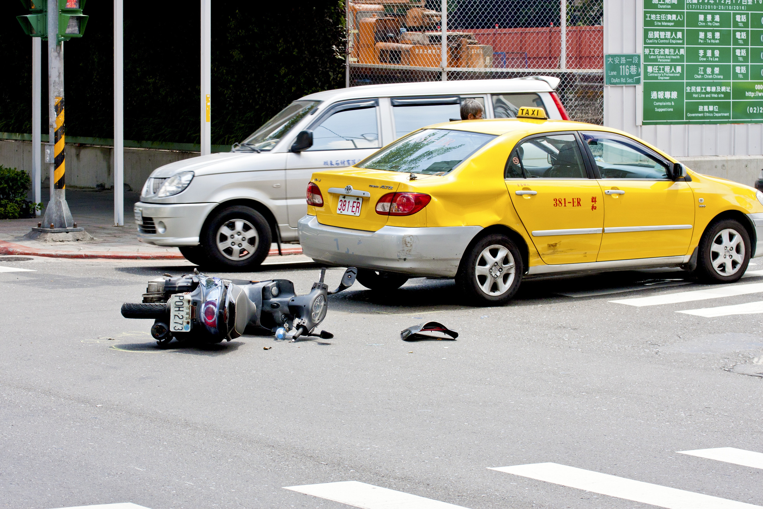 Taipei,Taiwan-July 4 a car accident that a motorbike hit a taxi in Taipei city,2011 in Taipei,Taiwan